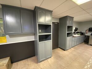 Andrade Painting & Decorating finishes cabinets in Ontario